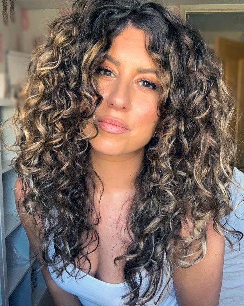 Beautiful Long Tight Ringlets On Female With Dark Brown Hair And Highlights