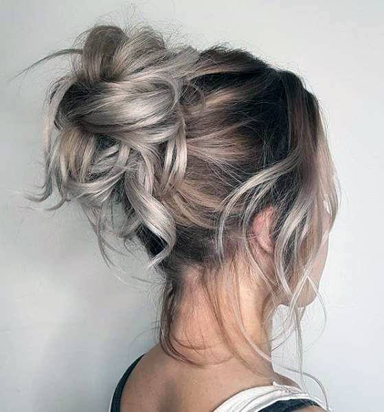 Beautiful Messy Top Knot Hairstyle For Women With Front Pieces Pulled