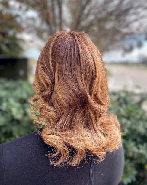 Beautiful Redhead Highlighted Shiny Curly Shoulder Length Womens Hairstyle Idea