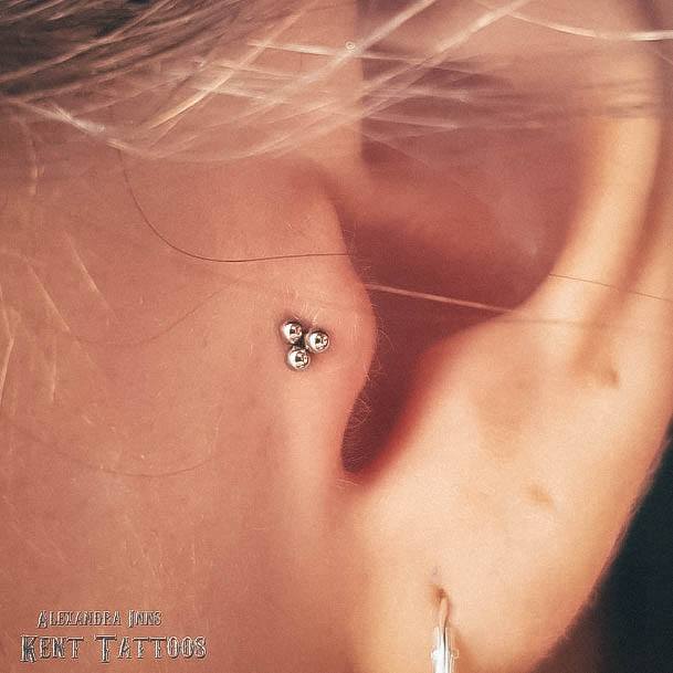 Beautiful Triple Ball Tragus Cartilage Piercing Inspiration For Girls