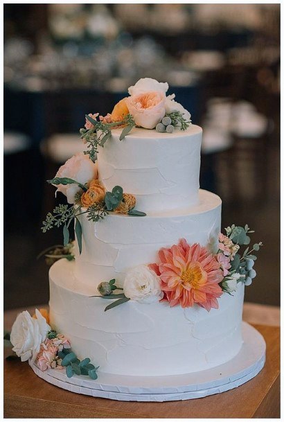 Beautiful White Tiered Cake With Full White And Orange Floral Wedding Cake Ideas