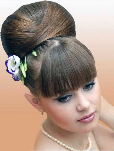 Beehive Hairstyle With Short Bangs For Girls