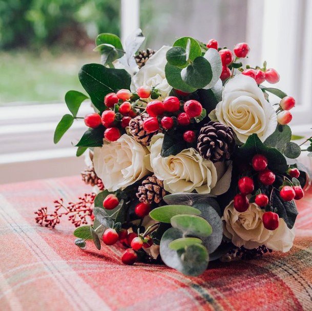 Berries And Roses With Acorns Christmas Wedding Flowers