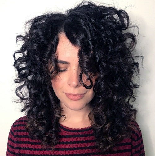 Big Beautiful And Dramatic Black Bouncy Curls Women’s Hairstyle Idea