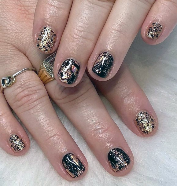 Black And Glitter Gold Nail Polish