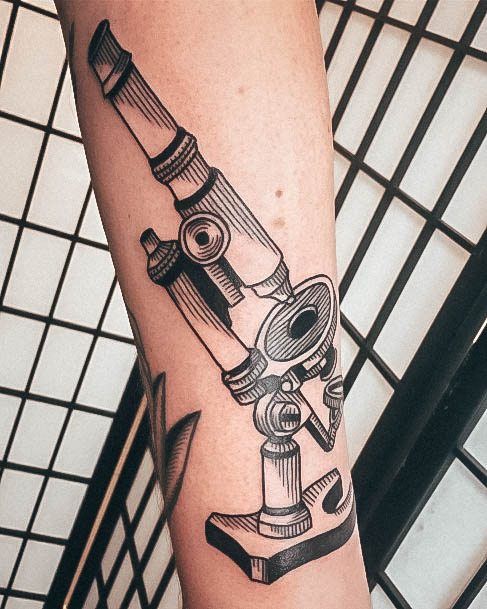 Black And Grey Traditional Incredible Microscope Tattoo For Ladies