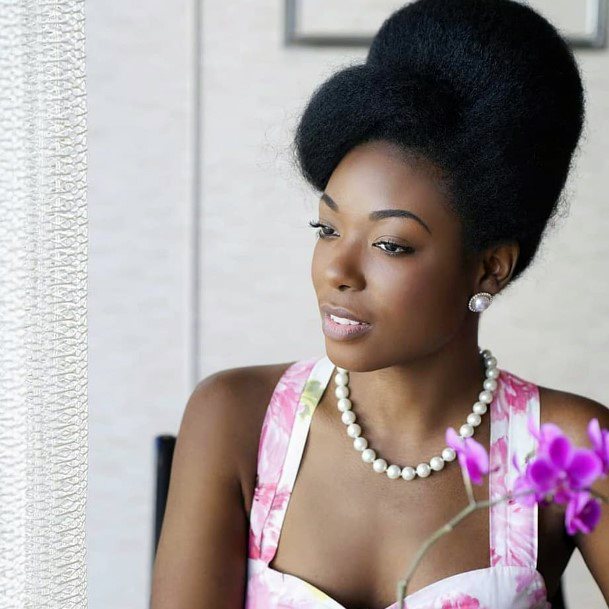 Black And Voluminous Vintage Tall Updo Womens Hairstyle Idea