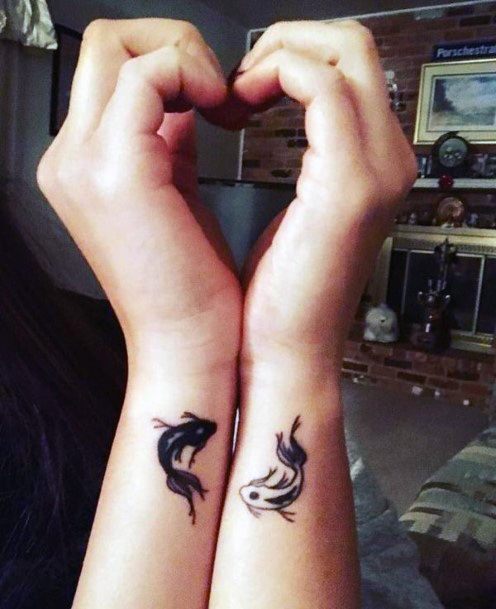 Black And White Fish Tattoo Womens Wrist