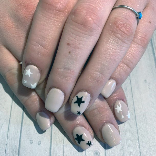 Black And White Star Pattern On Nude Nails For Females