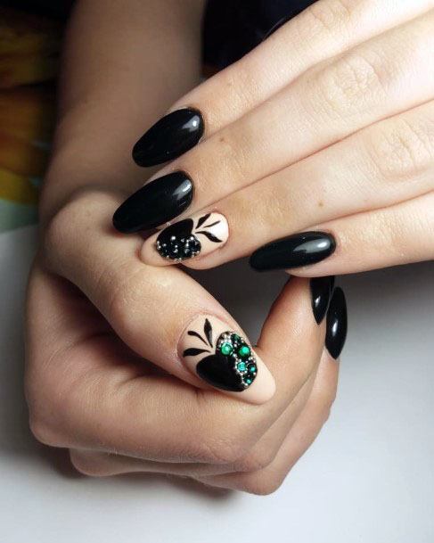 Black Apple Adorned With Green Stones Nail Art