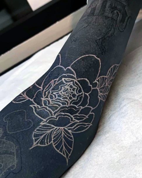Black Base And White Ink Flower Tattoo Women