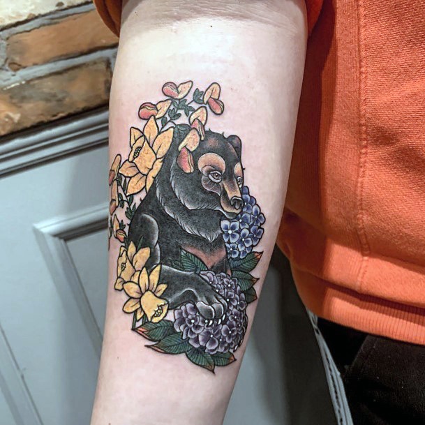 Black Bear And Flowers Tattoo For Women