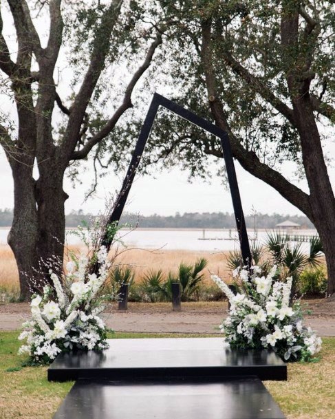 Black Bench And White Roses Wedding Decor