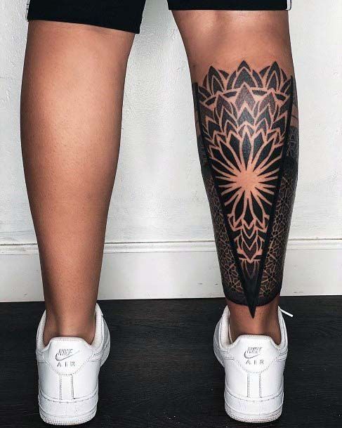 Black Blast Floral Geometric Tattoo On Womens Legs