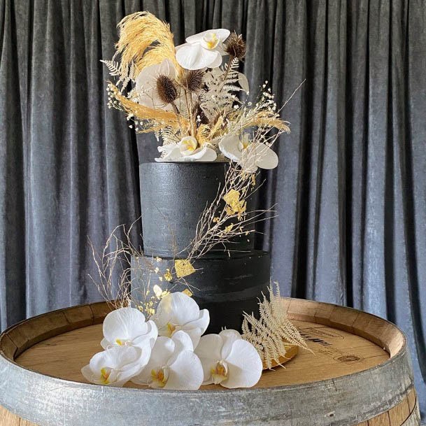 Black Cake And White Wedding Flowers