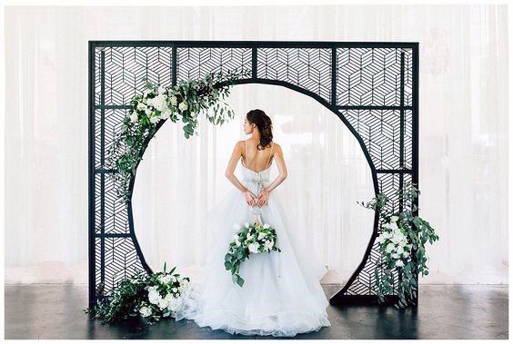 Black Circular Wall And White Dressed Bride Wedding Decor