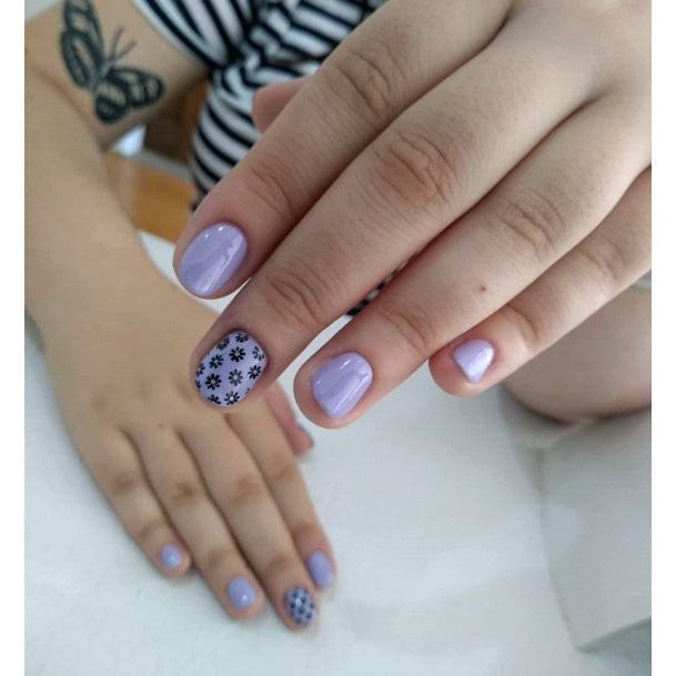 Black Flowers On Light Purple Colored Nails