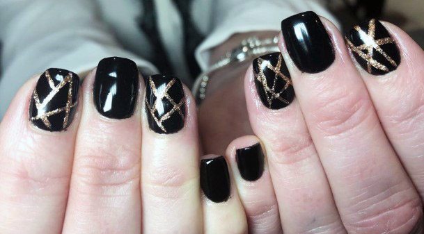 Black Nail Polish With Crisscross Golden Lines