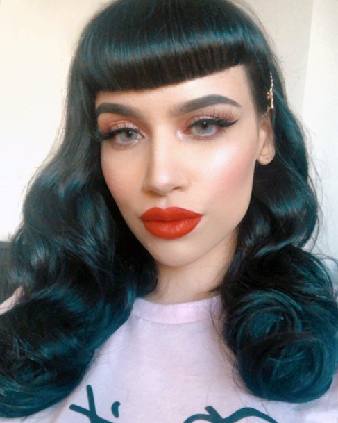 Black Shiny And Sleek Vintage Bang Curly Hairstyles For Women