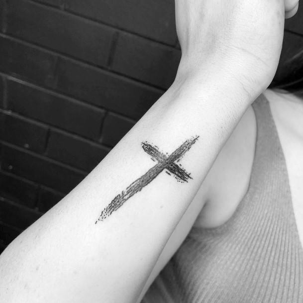 Black Smudged Cross Tattoo Womens Forearms