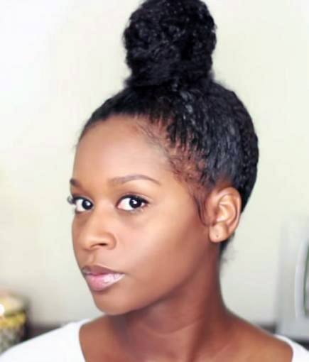 Black Woman With Afro Hair In Tight Top Knot Hairstyles