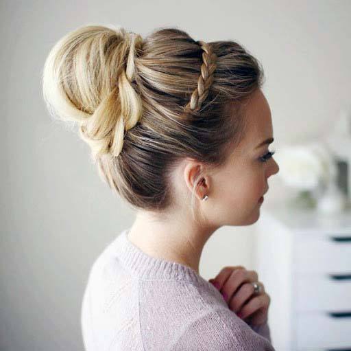 Blonde Haired Female With Thick Back Hair Bun And Braided Crown