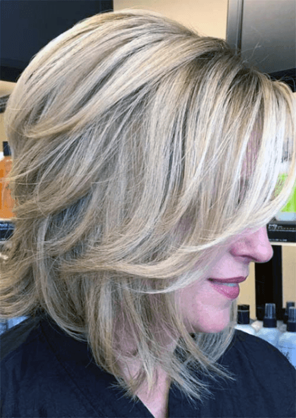 Blonde Layered Bob Side Bangs Medium Length Hairstyles For Women Over 50