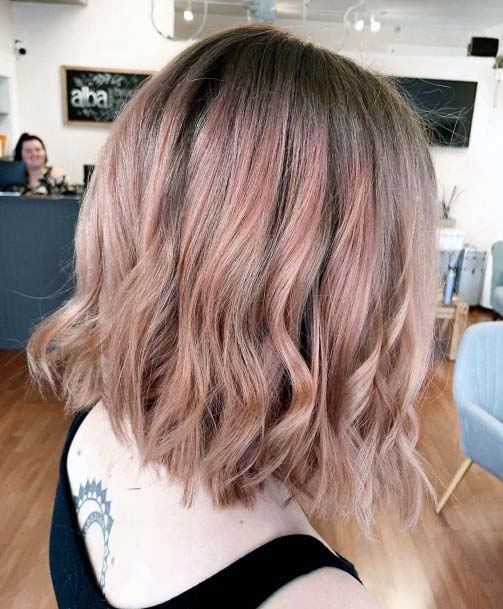 Blonde Medium Length Hair Female With Hints Of Pink For Spring Weather