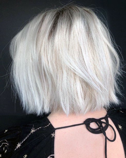 Blow Dried Silver Choppy Haircut Women