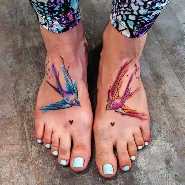 Blue And Pink Pair Of Birds Foot Tattoo Women