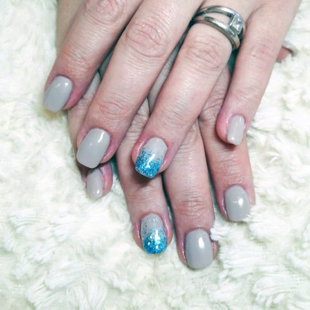 Blue Sparkles On Light Grey Nails Squoval Shape