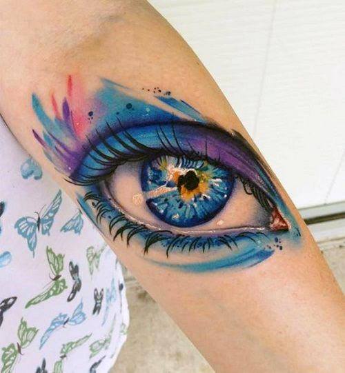 Blue Themed Eye Tattoo For Women