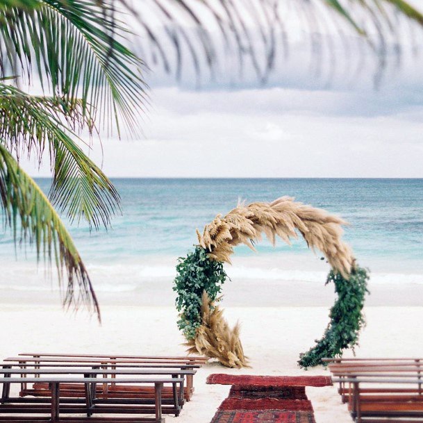 Bohemian Inspired Dried Grass And Greenery Arch Beach Wedding Ideas