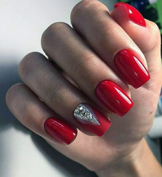 Bold And Bright Red Nails With Triangular Silver Design For Women