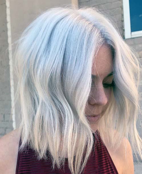 Bold Bright Platinum Blonde Textured Wavy Shoulder Length Womens Hairstyle