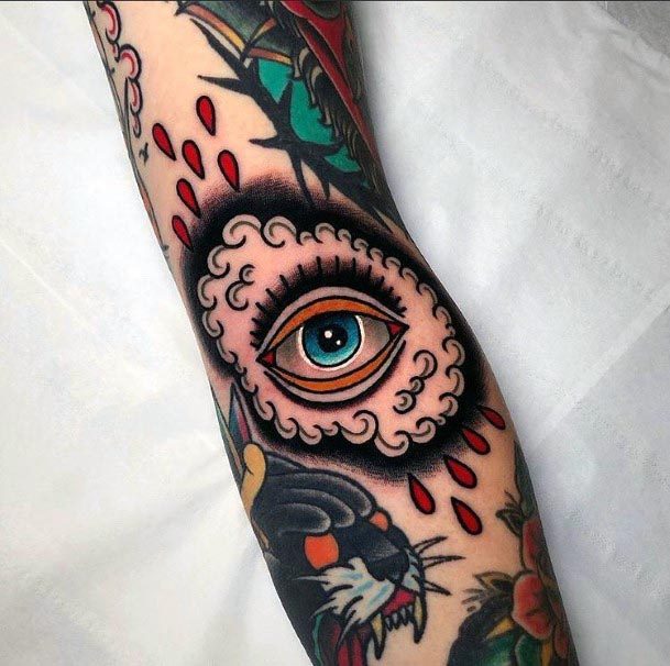 Bold Colored Eye Tattoo For Women