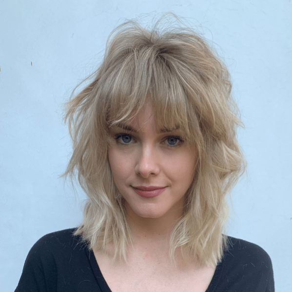 Bold Messy Textured Ashy Blonde Short Bang Shag Hairstyles For Women