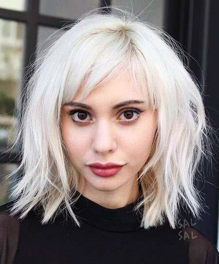 Bold White Platinum Blonde Textured Bob With Bangs Womens Hairstyle