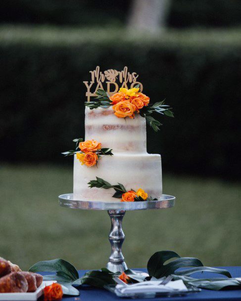 Bold Yellow Hawaiian Wedding Flowers On Cake