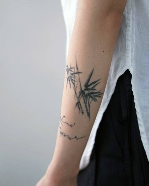 Breathtaking Bamboo Tattoo On Girl