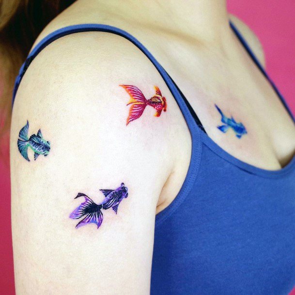 Breathtaking Betta Fish Tattoo On Girl