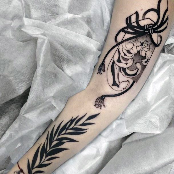 Breathtaking Black Ink Tattoo On Girl