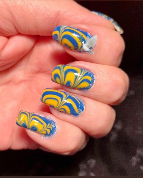 Breathtaking Blue And Yellow Nail On Girl