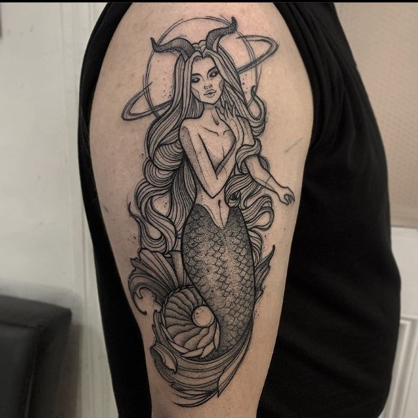 Breathtaking Capricorn Tattoo On Girl Arm