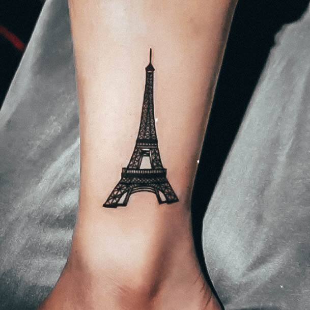 Breathtaking Eiffel Tower Tattoo On Girl