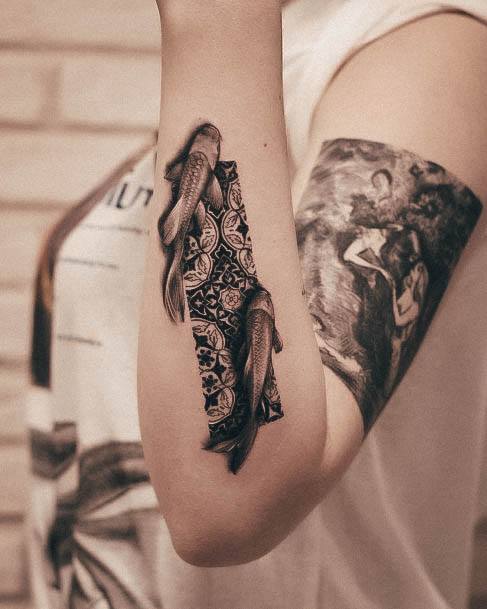 Breathtaking Fish Tattoo On Girl