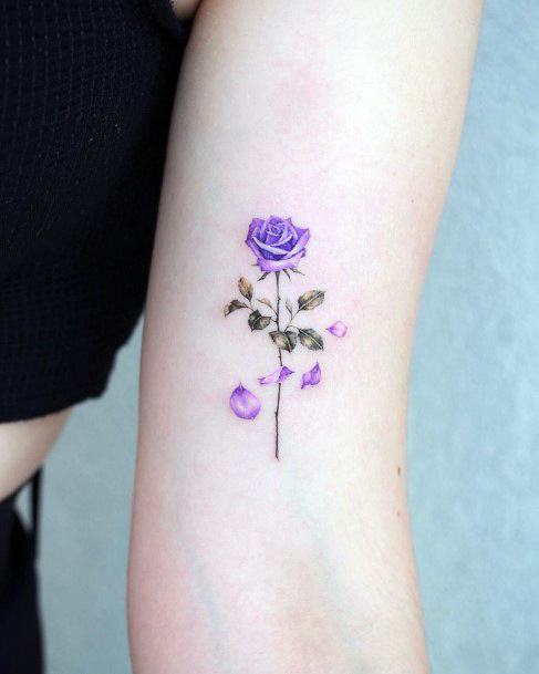 Breathtaking Flower Petal Tattoo On Girl