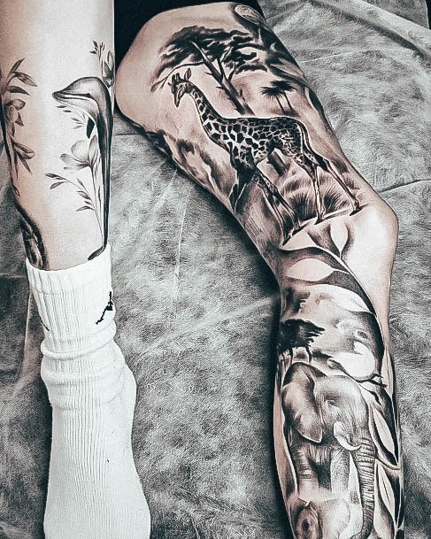 Breathtaking Giraffe Tattoo On Girl Leg Sleeve