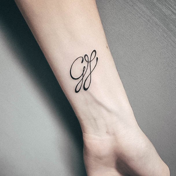 Breathtaking Initials Tattoo On Girl