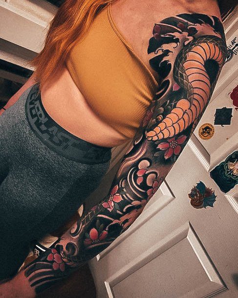 Breathtaking Japanese Tattoo On Girl Snake Sleeve